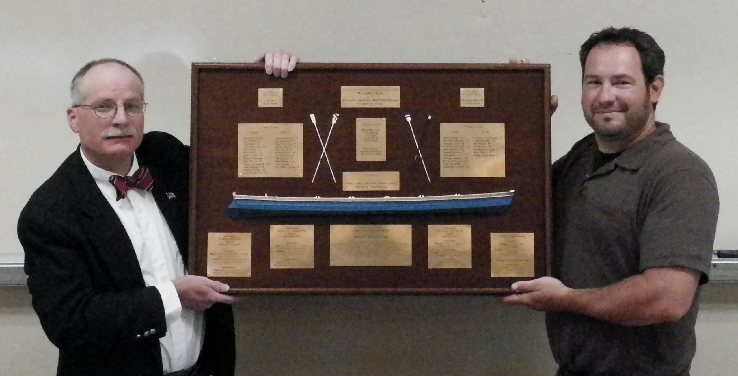 Presentation of the half hull award to coach Richard Kesor